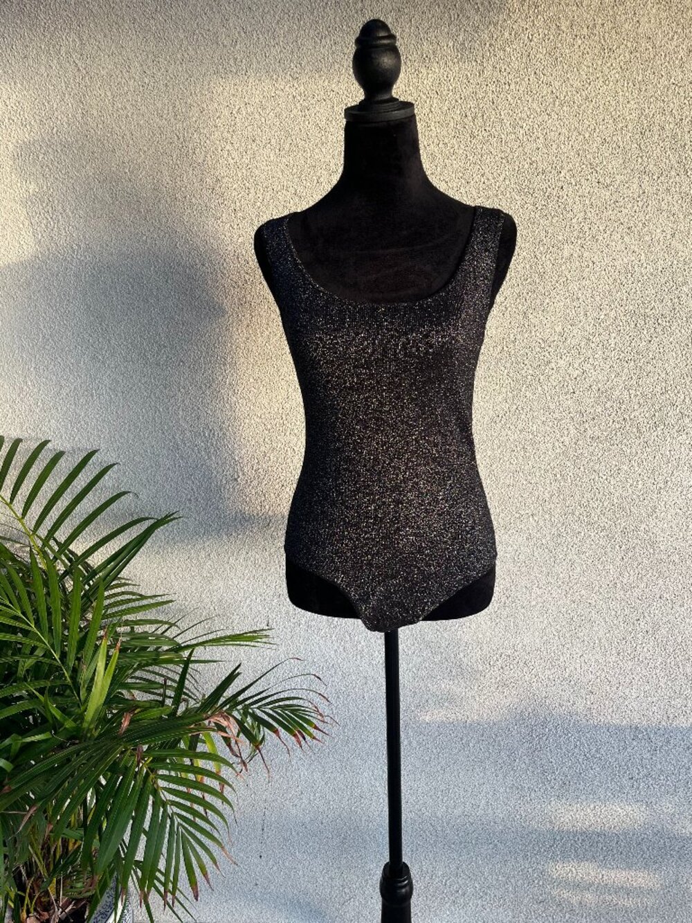 Black and silver body suit